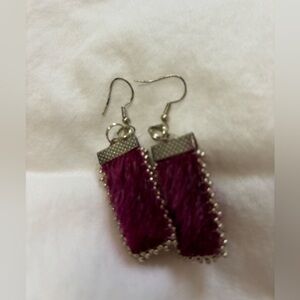 Seal hand made earrings made by Quebec Innuit.